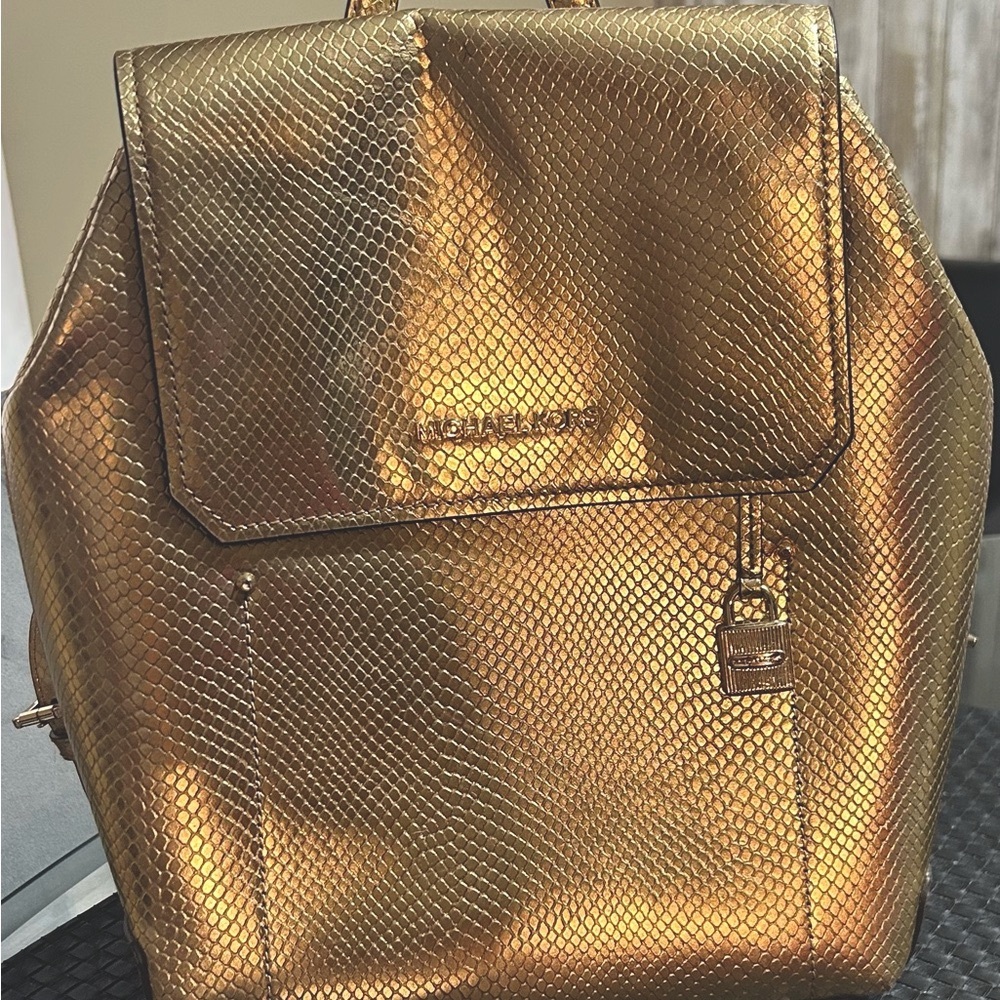 Michael Kors Gold Textured Backpack with Flap Closure